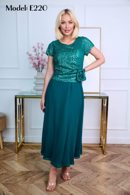Jurk met glitter bovenkant en een bloem