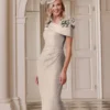 beige jurk moeder van de bruid